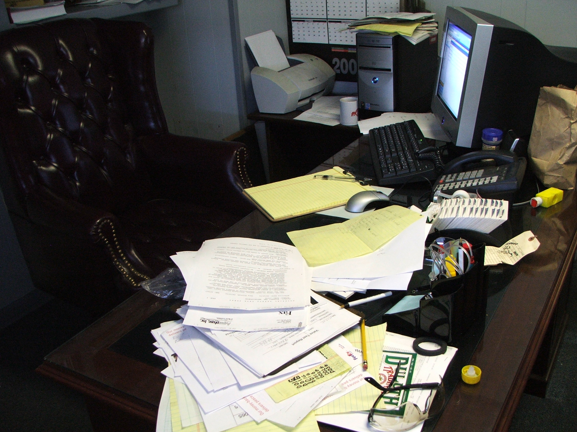 Messy desk full of clutter